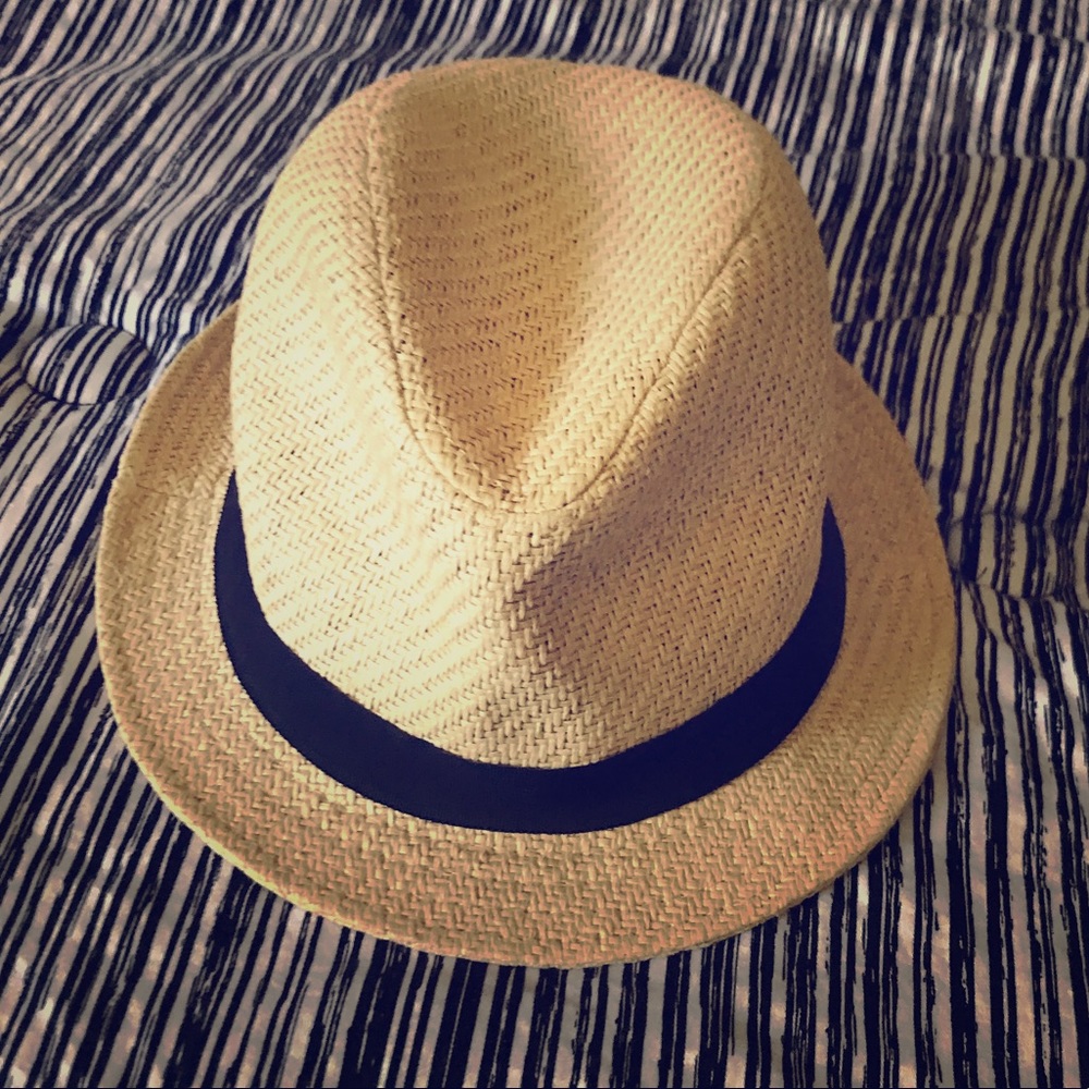 Tan hat with black bow